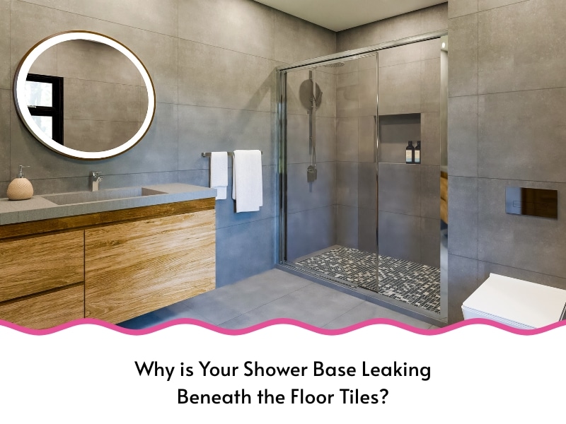 Contemporary grey-tiled bathroom with a visible shower area prone to shower base leaking beneath the floor tiles.