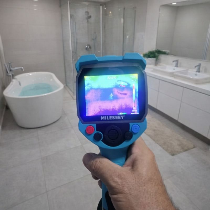 Bathroom leak detection using infrared camera near shower and freestanding bath